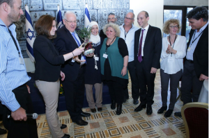 President of Israel Reuven Rivlin, Leo Baeck Community Center Director Yoav Yagol, and leadership of community centers from throughout Israel